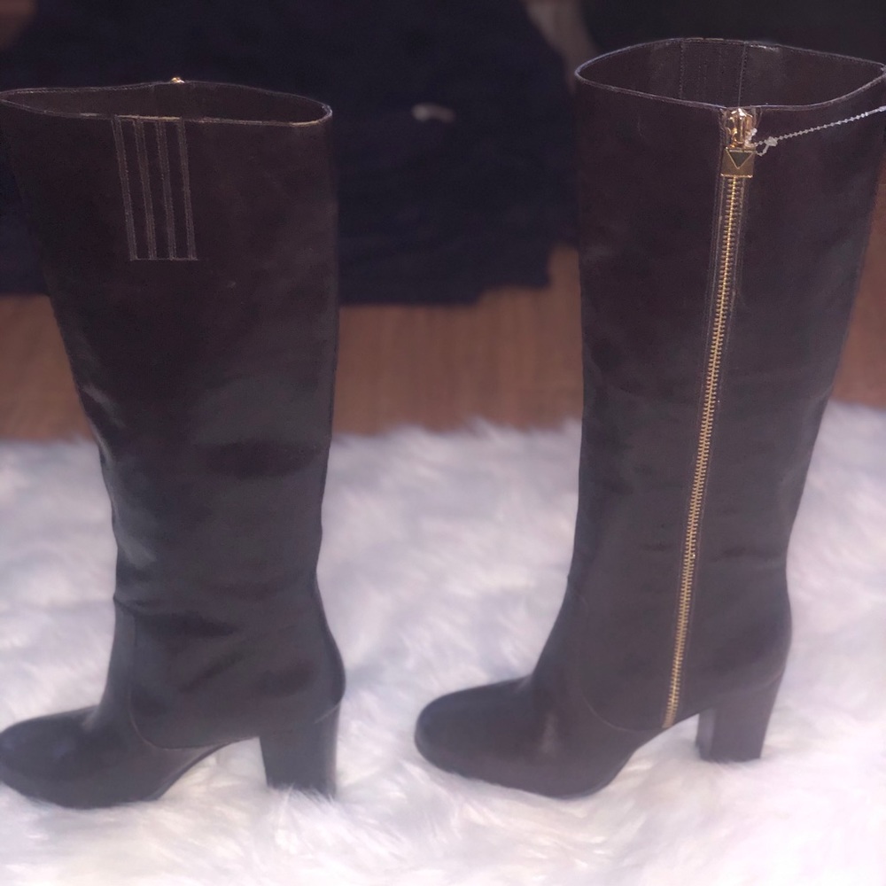 Brand new Michael Kors tall boots.